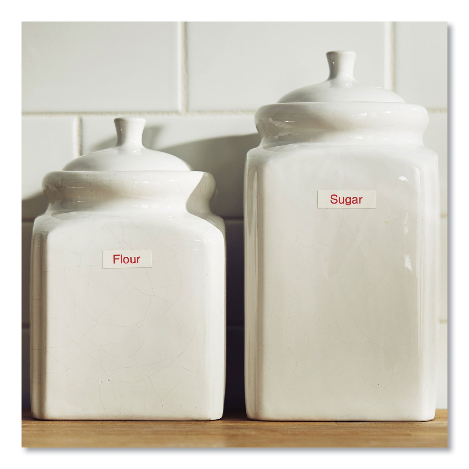 tze-standard-adhesive-laminated-labeling-tape-047-x-262-ft-red-on-white_brttze232 - 4