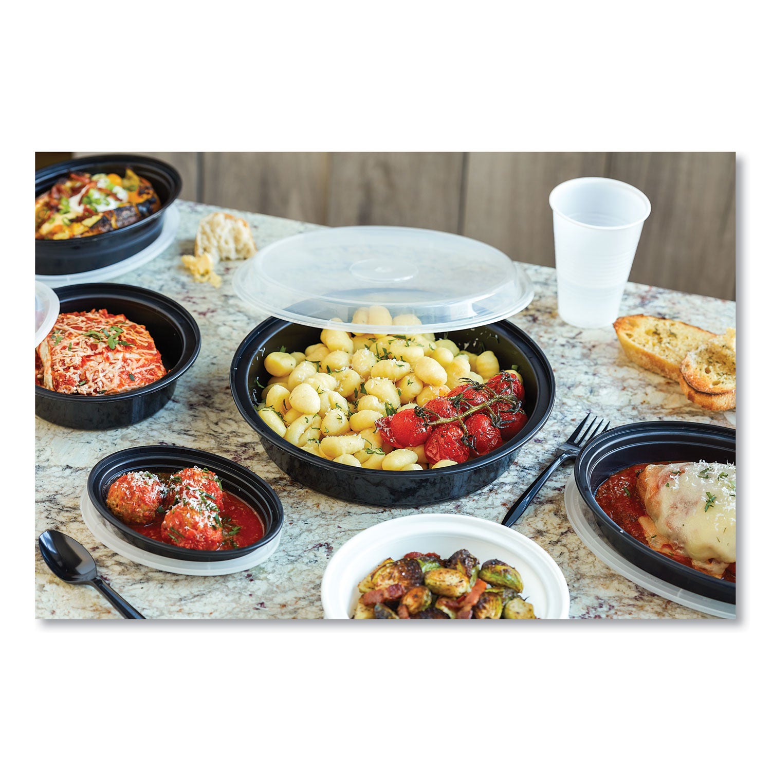 newspring-versatainer-microwavable-containers-oval-6-oz-57-x-4-x-11-black-clear-plastic-150-carton_pctoc06b - 2