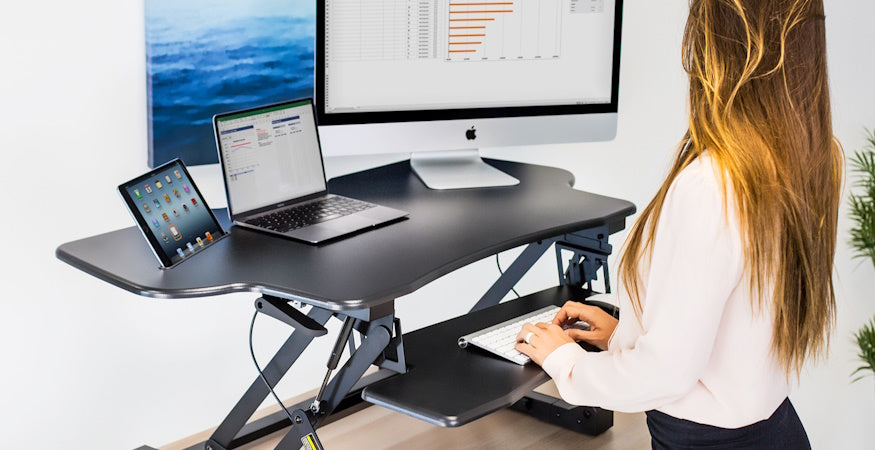 Boost Your Productivity with Sit-Stand Desk Converters