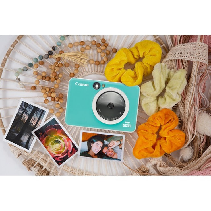 canon-ivy-cliq2-5-megapixel-instant-digital-camera-turquoise-autofocus_cnmivycliq2turq - 5