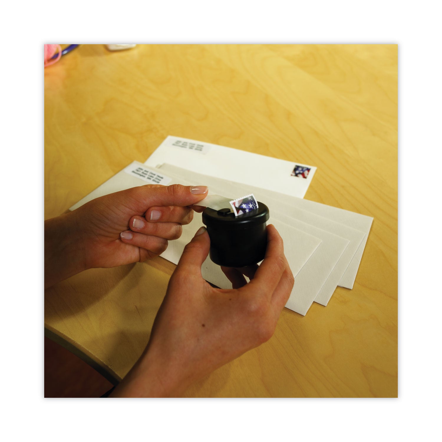 Ultimate Stamp Dispenser, One 100 Count Roll, Black, Plastic, 2" Diameter x 1.69"h - 