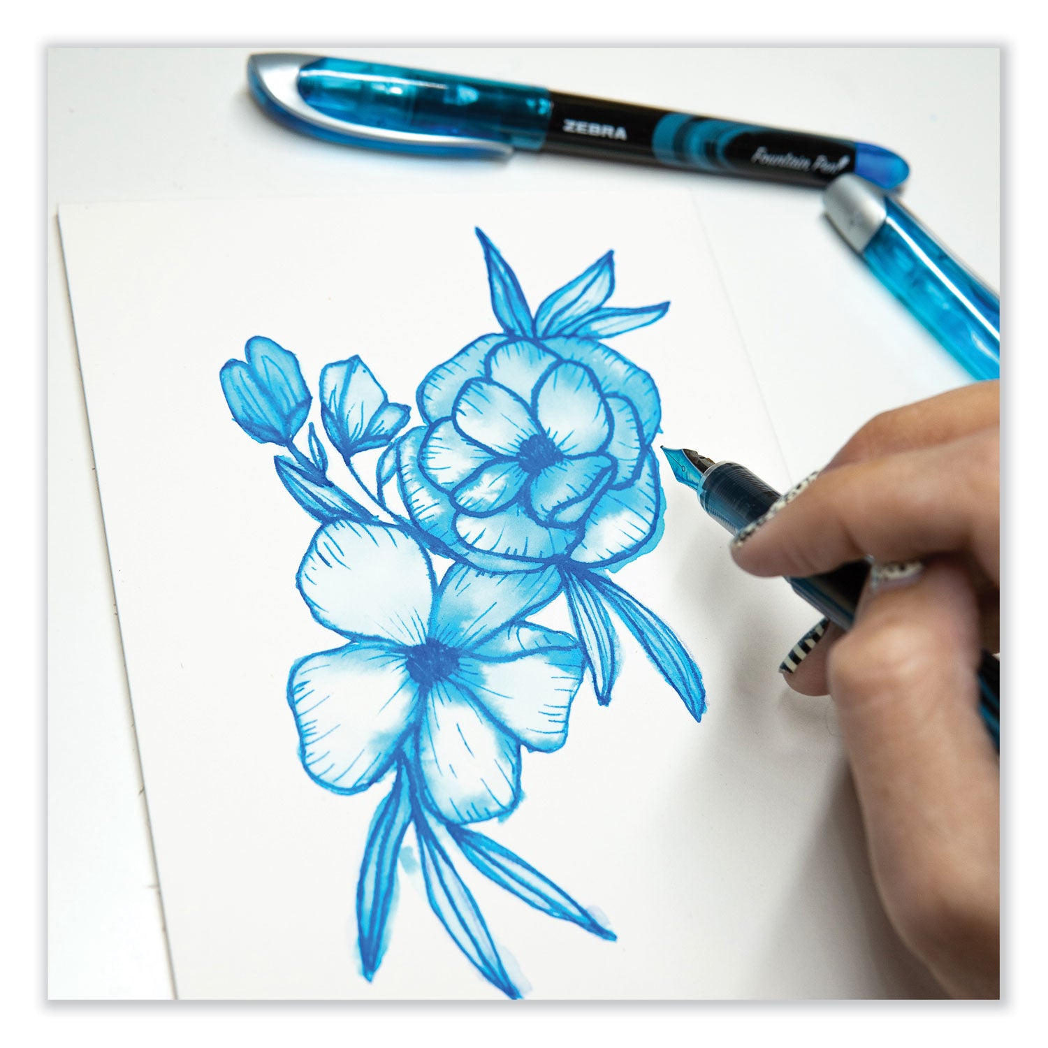 fountain-pen-fine-06-mm-blue-ink-black-blue-barrel-12-pack_zeb48320 - 5
